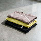 Folded Adidas T-shirts and tops