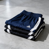 Folded Adidas men's sports trousers